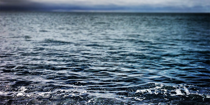 Picture of an Ocean and Dark Sky