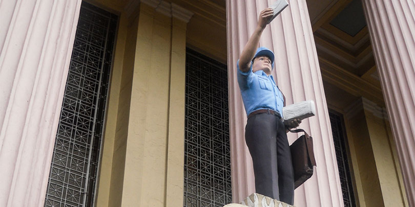 Picture of a Postman Statue